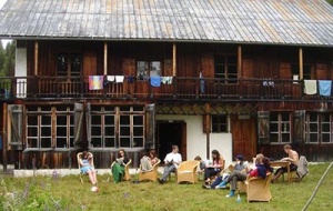 Students relax outside of the University College Chalet