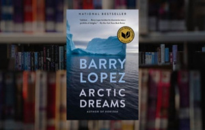 Cover of Arctic Dreams on a bookshelf background