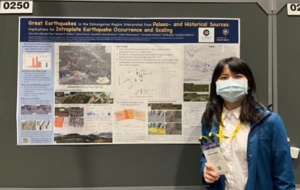 Chia-Hsin Tsai in front of her poster at AGU