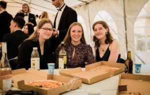 Martha Storey at black-tie event with pizza and friends
