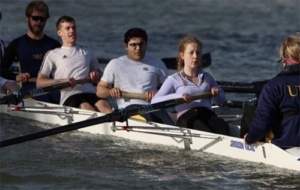 four rowers and cox in univ top