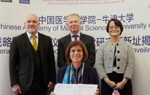 Professor Tao Dong with Professor Louise Richardson and other academics