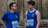 two runners in blue univ tops