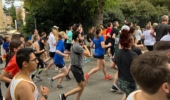 large crowd of runners on a road