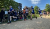 runners in a park from a low angle