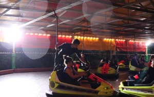 People playing on dodgems