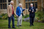 three smartly dressed elderly men in conversation