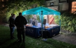 A refreshments tent in main quad at night