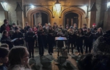 choir singing at night in main quad
