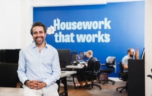 Man smiling in office with background saying "Housework that works" 
