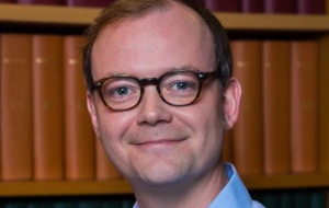 Man wearing glasses smiling