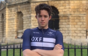 Man in cycling kit with crossed arms