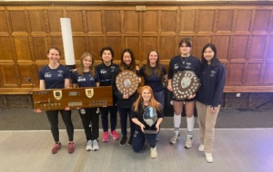 Fencing women's team with trophies 