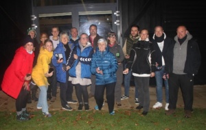 Participants in last year's sleepout smiling at night