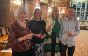 Four people attending memorial dinner