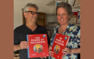 David Pyle and Tamsin Mather holding their new book The Power of Volcanoes
