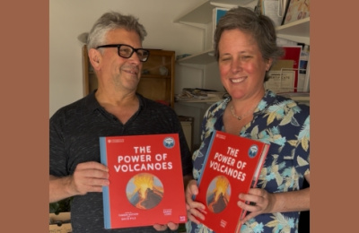 David Pyle and Tamsin Mather holding their new book The Power of Volcanoes