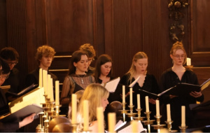 Choir members singing in the Chapel at University College, Oxford