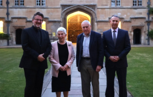 Giles Underwood, Lady Crewe, Sir Ivor Crewe and William Roth standing in the main quad at University College, Oxford