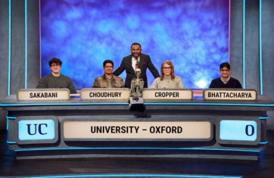 A team of students on University Challenge with the presenter