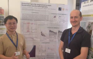 Xiangying Ye standing in front of his poster with Professor Richard Palin